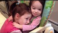 Eliana and Julia hugging sisters