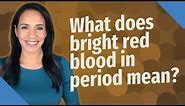 What does bright red blood in period mean?