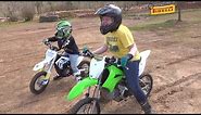 kids riding their new dirt bike on the track for the first time. Let's go!!