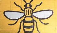 The significance of the Manchester bee symbol