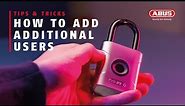 ABUS TOUCH™ REGISTERING ADDITIONAL USERS 🔒 The biometric padlock for up to 20 fingerprints