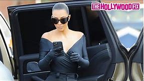Kim Kardashian Showcases Her Curves In A Skin-Tight Black Outfit While Out Shopping With A Friend