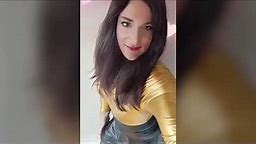 Transgender feminine in sexy gold bodysuit and leather skirt
