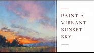Learn to paint a vibrant sunset sky in soft pastel