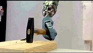 Robot Arm Using a Hammer