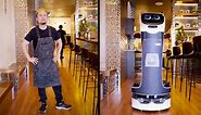 Cute robot competes with a human waiter at a New York restaurant