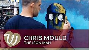 Illustrator Chris Mould painting The Iron Man