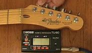 How to use an electronic guitar tuner to tune your guitar.
