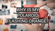 Why Is My Polaroid Flashing Orange? - FotoProfy