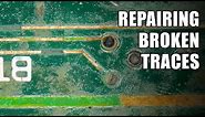 Repairing broken traces on a circuit board
