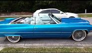 1970 Cadillac DeVille convertible on 22 inch Vogues and Daytons