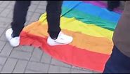 People Wipe Feet on LGBT Flag During Polish Independence Day Celebrations in Warsaw