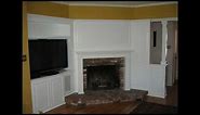 Built in white entertainment center cabinets and wall units