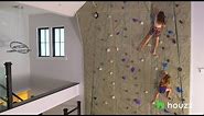 This Family Put a 26-Foot Rock Climbing Wall in Their Living Room