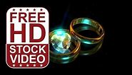 Free Stock Videos – wedding rings with heart shaped diamond on black background