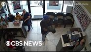 Man tries to rob Atlanta nail salon but gets ignored, video shows