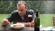 Sad man dining in the rain