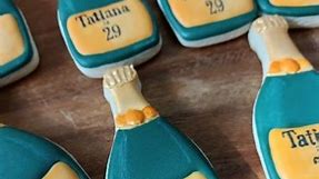 Champagne bottle cookies for a Champagne birthday. This fancy lady celebrated with some Veuve Clicquot, which is what I modeled the cookies after. Cutter from @theemeraldedgecookiecutterco #champagnebirthday #champagnecookies #burlingtonsugarcookies #burlingtonbaker #burlington #burlingtonontario | Cookies by Amanda Joy