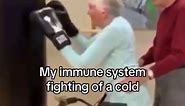 Request: old lady very lightly using punching bag