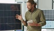 Renewable Energy Engineer Presenting Solar Power Project