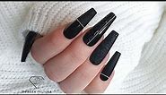 Black shiny and matte nail design with black sugar nail art.