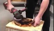 Guy grinding his burned pizza