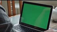 A man with laptop display in green screen- Stock Video Footage laptop green screen for mock up