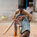 Children Playing Cricket Old Village
