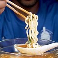 Eating Noodles with Chopsticks
