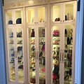 French Glass Shoe Cabinet