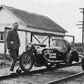 Sidecar Motorcycle On Railroad Tracks