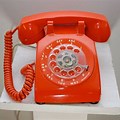 Vintage Orange Rotary Phone