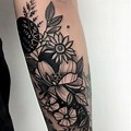 White and Black Flower Tattoos On Arm
