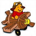 Winnie the Pooh Flying a Plane