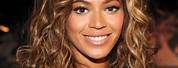 Beyoncé Brown Highlights Hair Curly