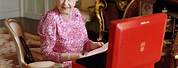 British Queen by a Red Post Box