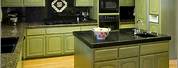 Green Kitchen Cabinets with Black Appliances