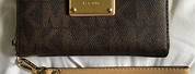 Michael Kors Wristlet with Chain Pattern