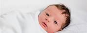 Newborn Baby Boy with Brown Eyes