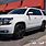 White Chevy Tahoe with Black Rims