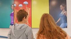 School children discovering anatomy of human body in the science museum