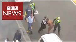 South African police brutality caught on camera #BBCtrending - BBC News