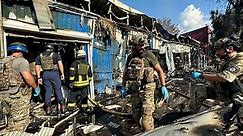 Ukraine: At least 17 dead in missile attack on market