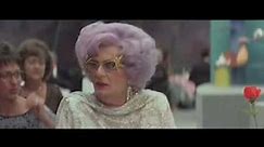 Rotating restaurant scene from Les Patterson Saves The World (featuring Dame Edna Everage)