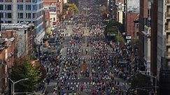 New Yorkers cheer on runners in New York City Marathon