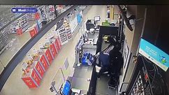 Terrifying footage shows machete wielding thugs raid a Co-Op store