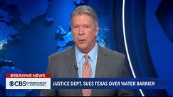 Justice Department sues Texas over river barrier