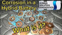 What is the corrosion in the hybrid battery and where does it comes from?