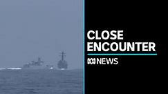 Chinese warship comes within metres of US destroyer in South China Sea