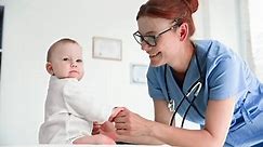 caring for child, a small child at an appointment with a female doctor in a medical office